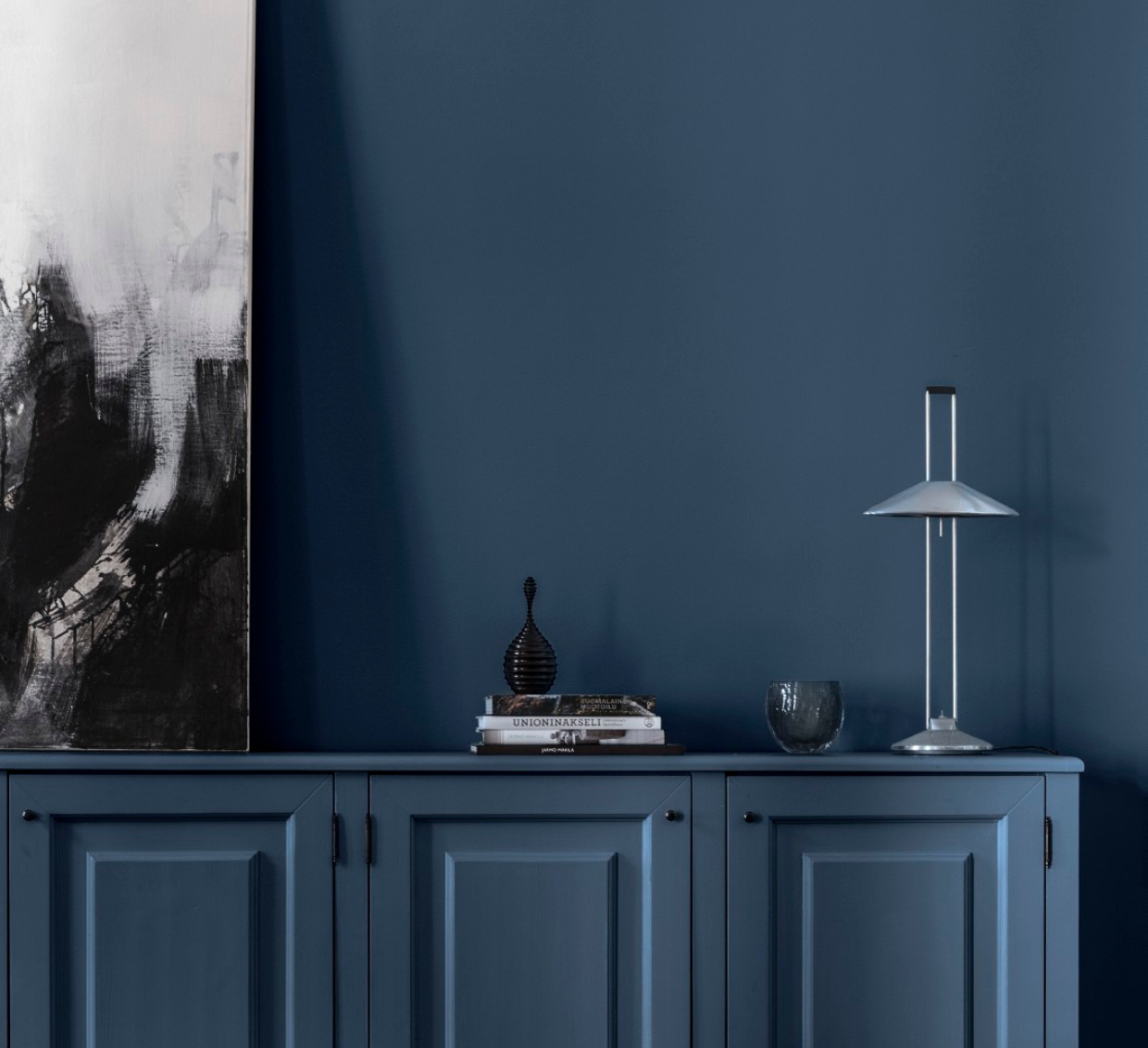 dark navy blue side table and accessories 