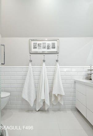 white wall with a tiny touch of blue