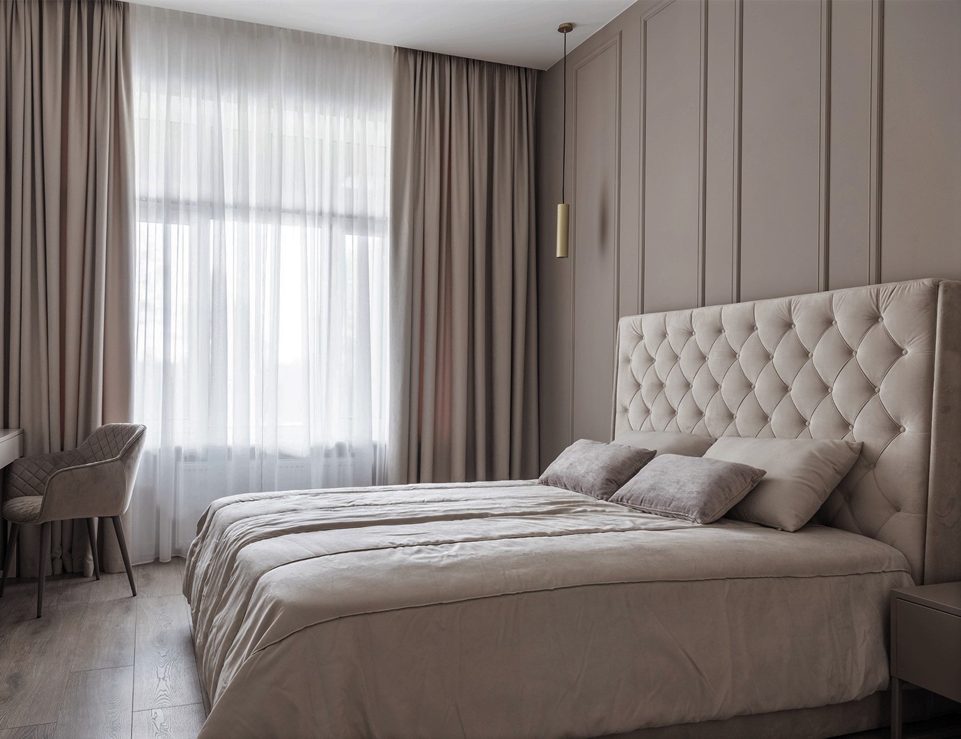 bedroom with brown panelled walls