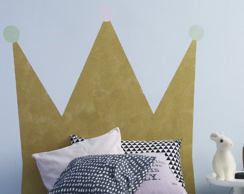 gold crown on kids wall