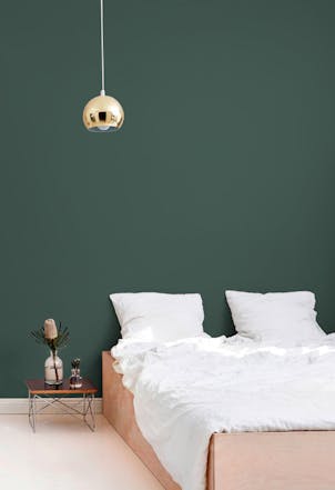 Dark green bedroom wall