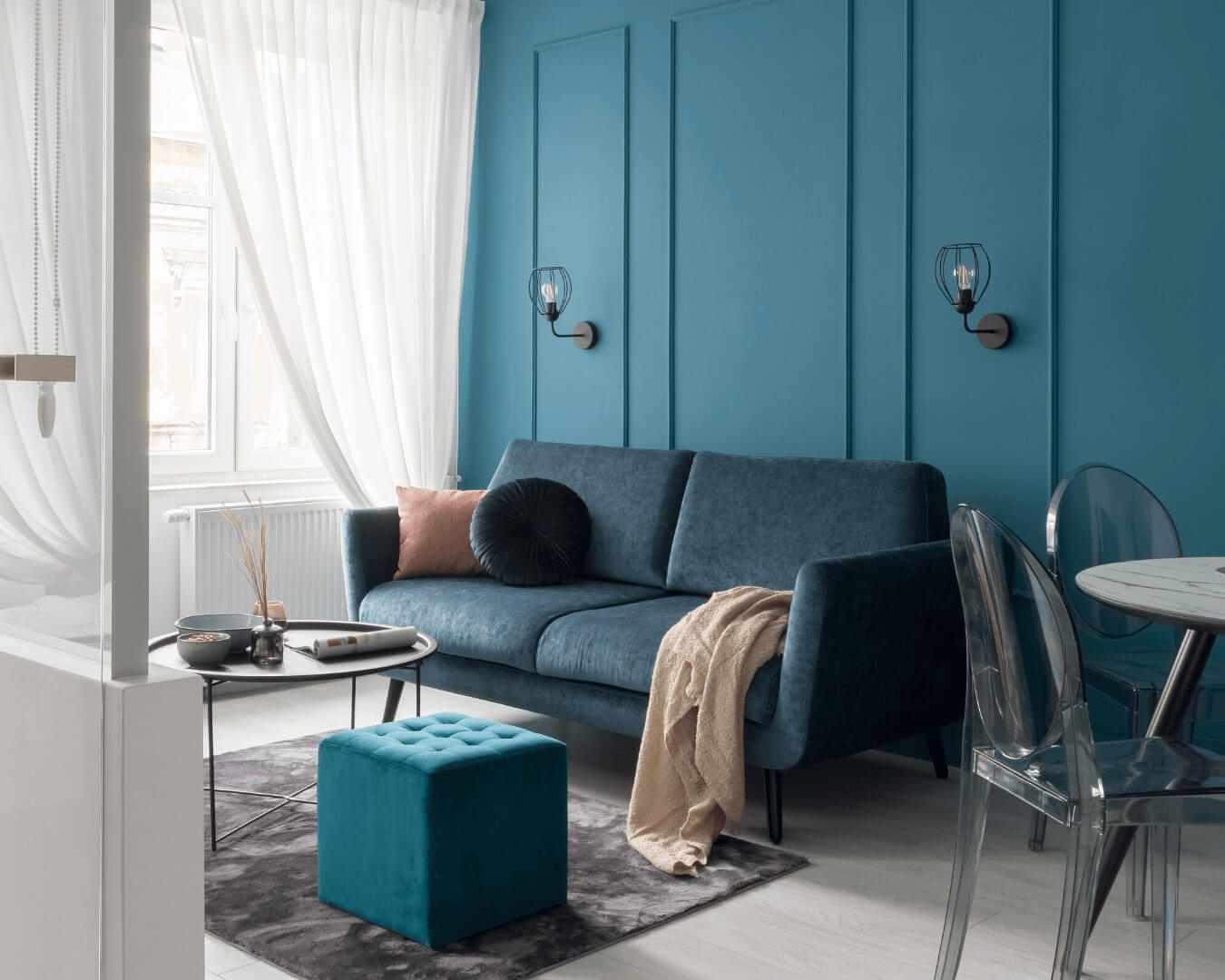 Grey white and teal store living room