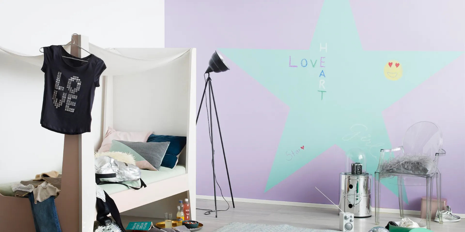 Blue Chalkboard Star on Purple Wall and Single Bed