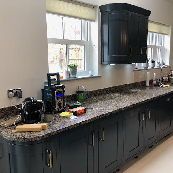 kitchen with deep blue cabinetry