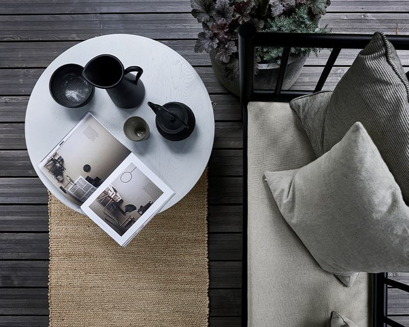 Birdseye view of garden furniture on grey terrace