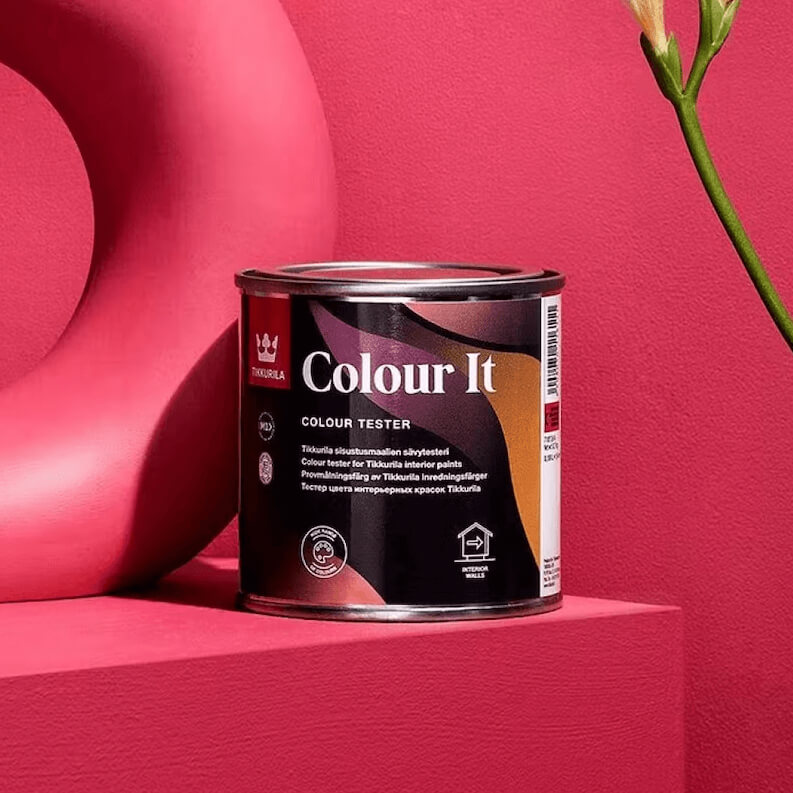paint sample tin against hot pink wall