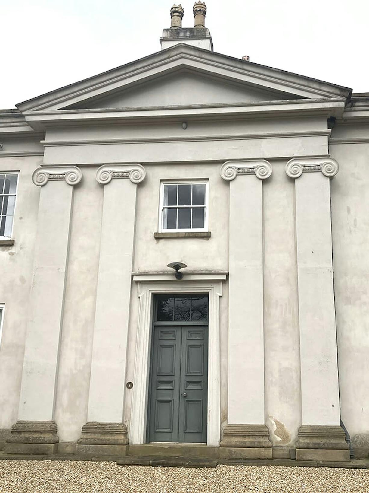 horizontal view of a historic building before image