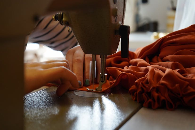 Tilly Lloyd creating a garment