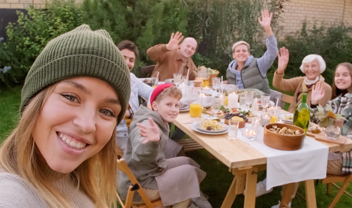 Girl takes a selfie at a family BBQ