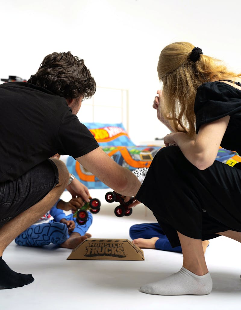 Directing child models for Hot Wheels toy car photoshoot