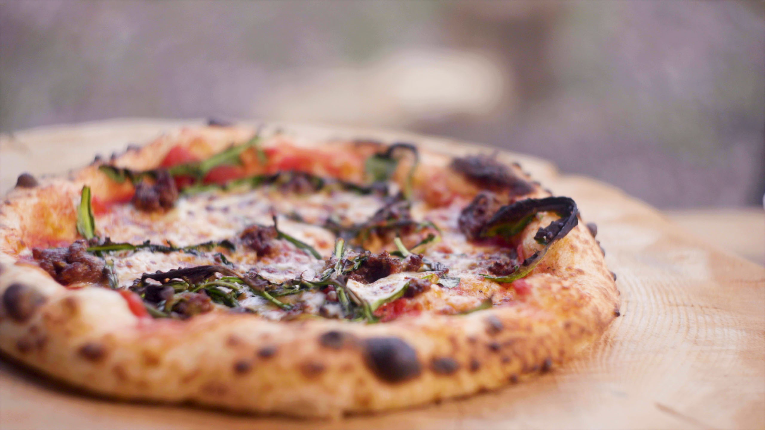 Fresh handmade sourdough pizza wooden block