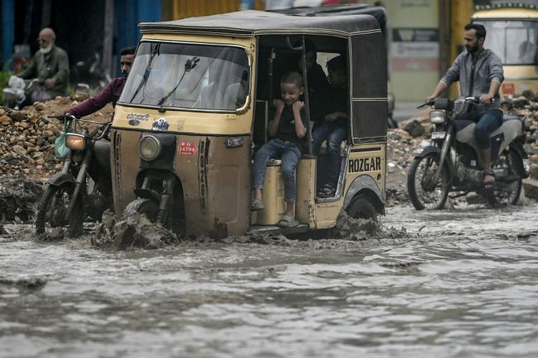 Death toll rises after Pakistan hit by flash floods and heavy rains