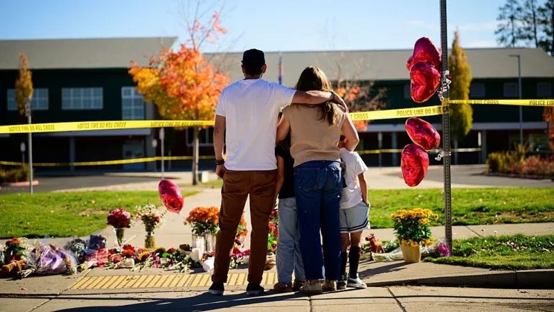 Oregon teacher fought school attacker before armed dad shot suspect