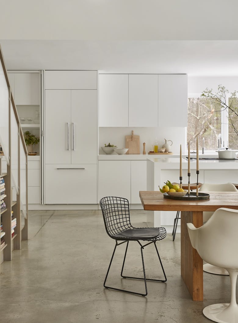 Tina-Ramchandani-Interior-Design-Stone-Ridge-Kitchen-Dining-Table-Into-Kitchen-View-of-Staircase