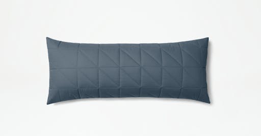 Body pillow with quilted cover in Slate color. 