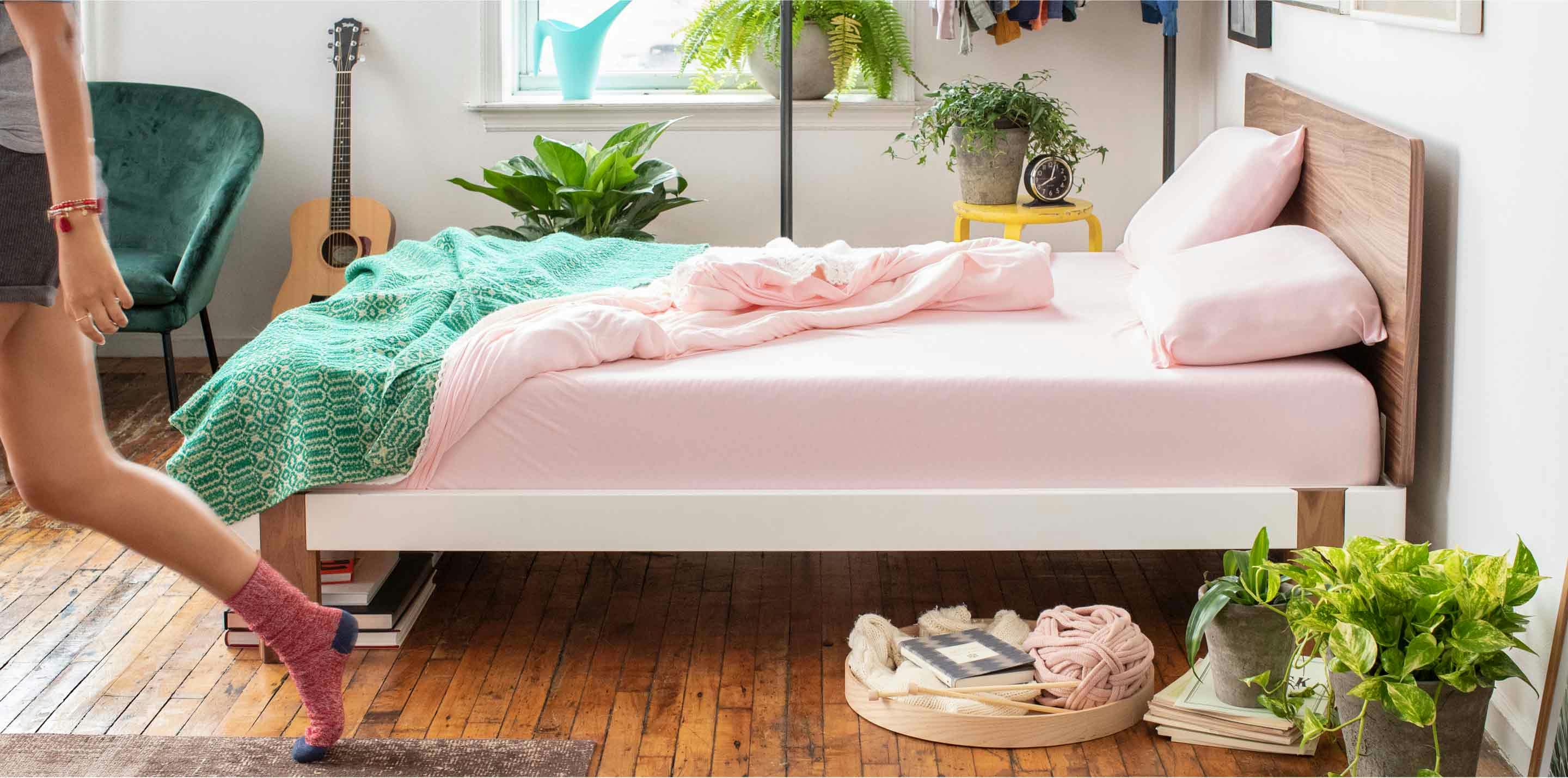 A Tuft & Needle mattress on a contrast platform bed