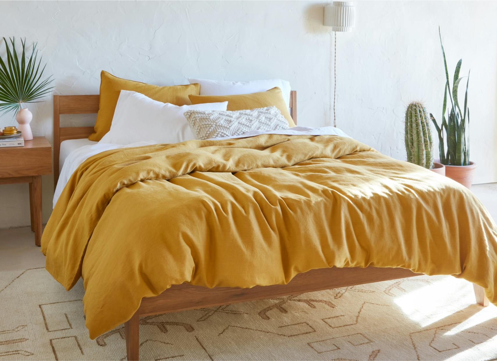 Bed made with hemp sheet set by Tuft & Needle
