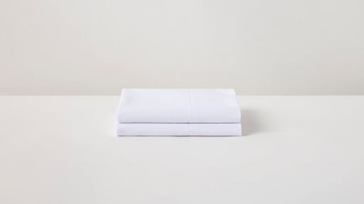 2 folded percale pillowcases in cloud