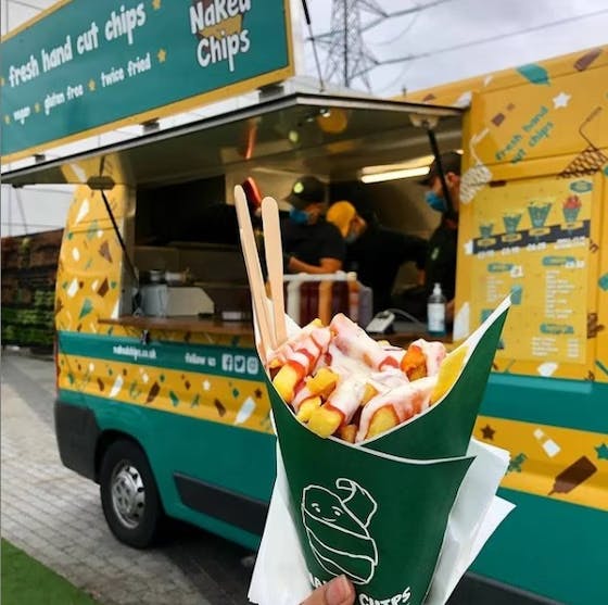 fish and chips in a green cone
