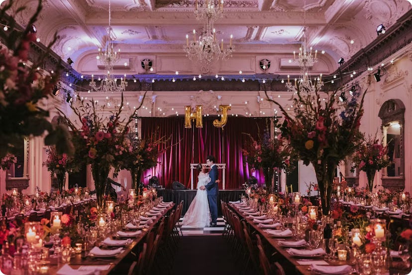 couple married in front of empty tables