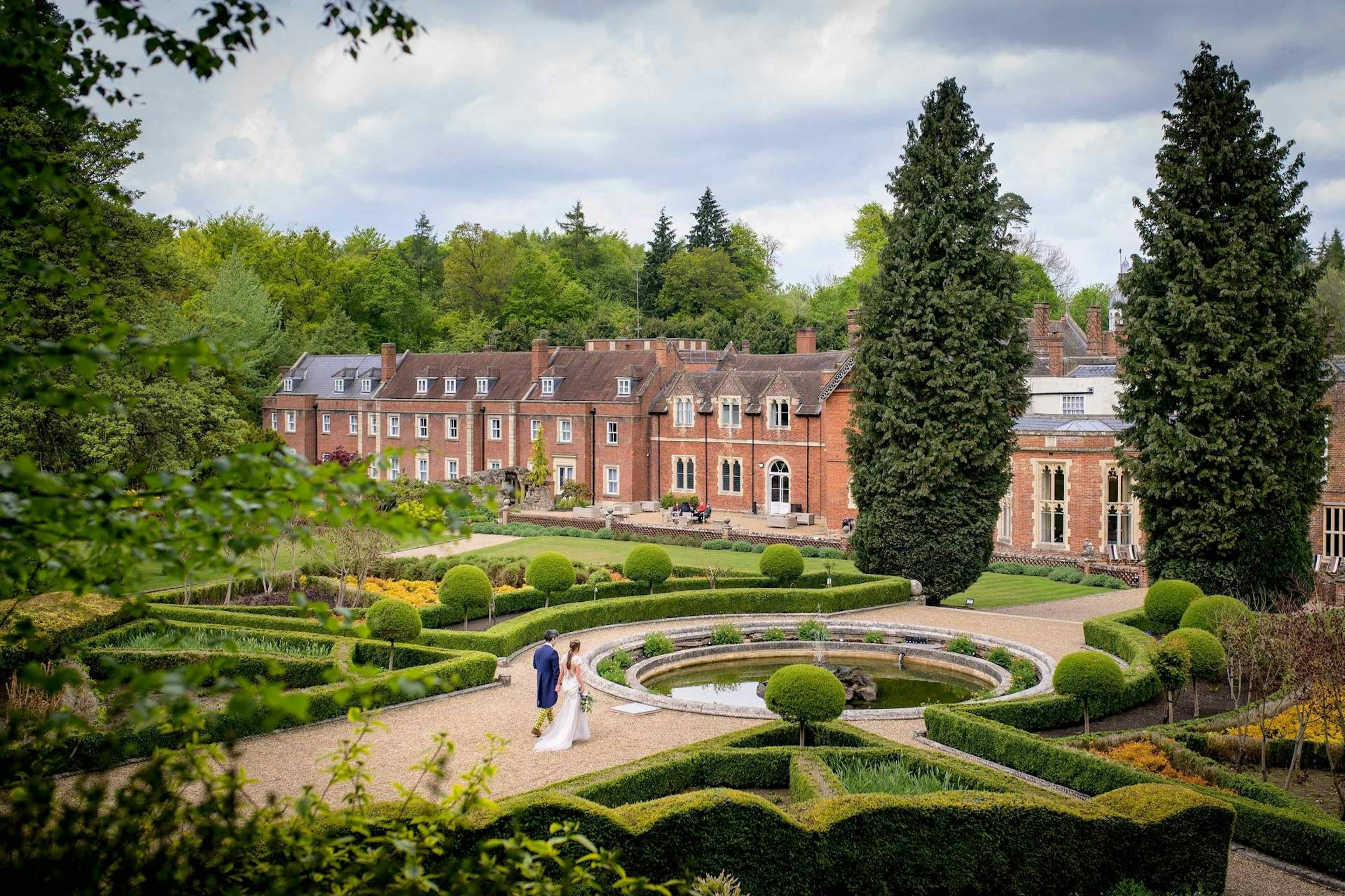 couple in venue courtyard with maze