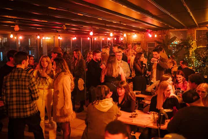 crowd in bar at night