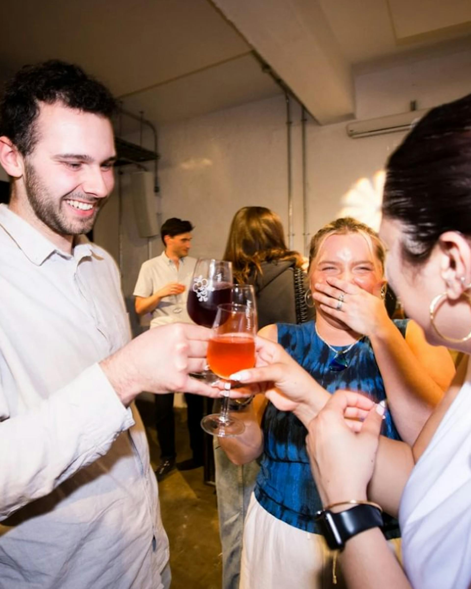 group laughing at event