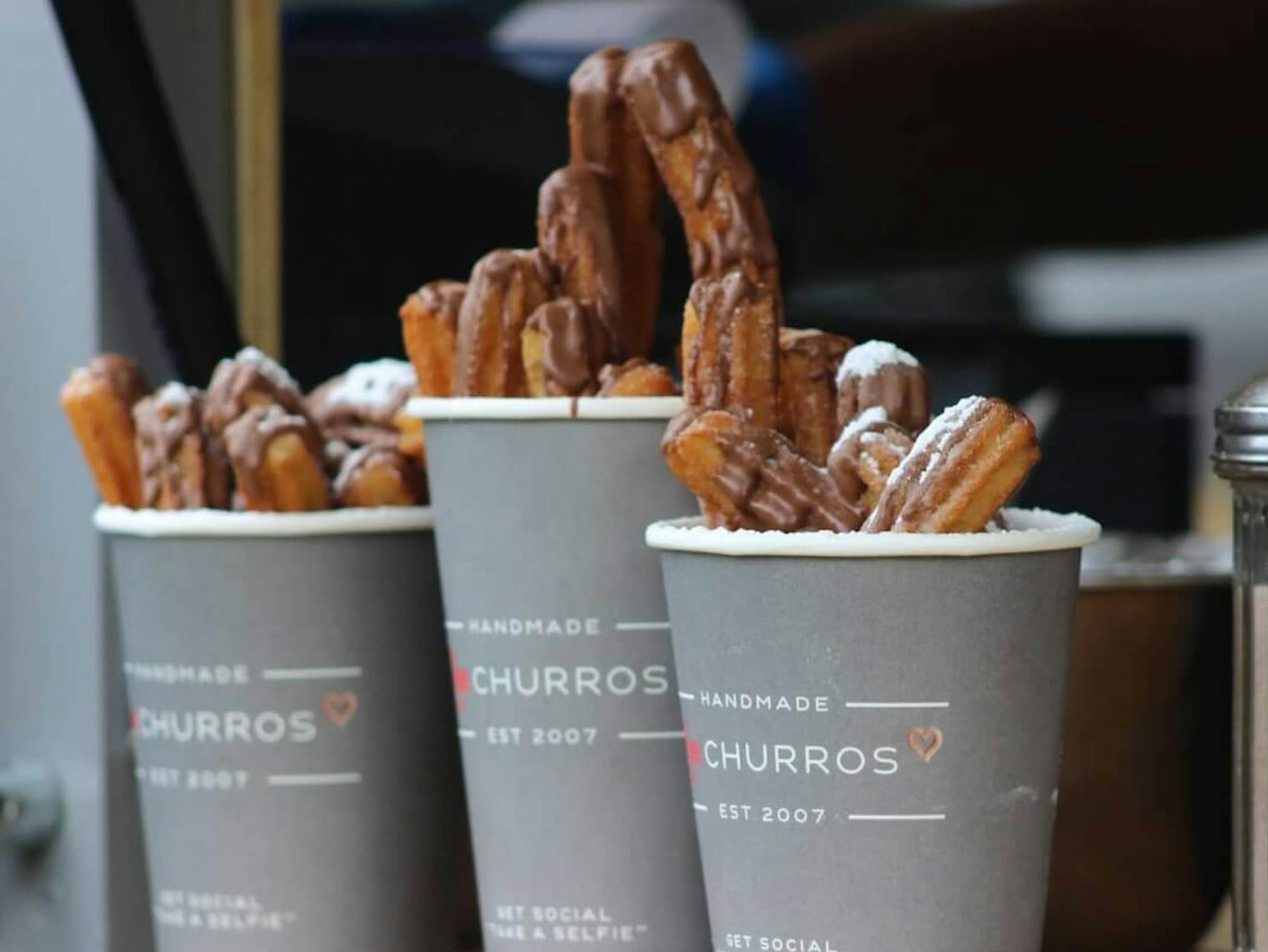 churros in a grey cup