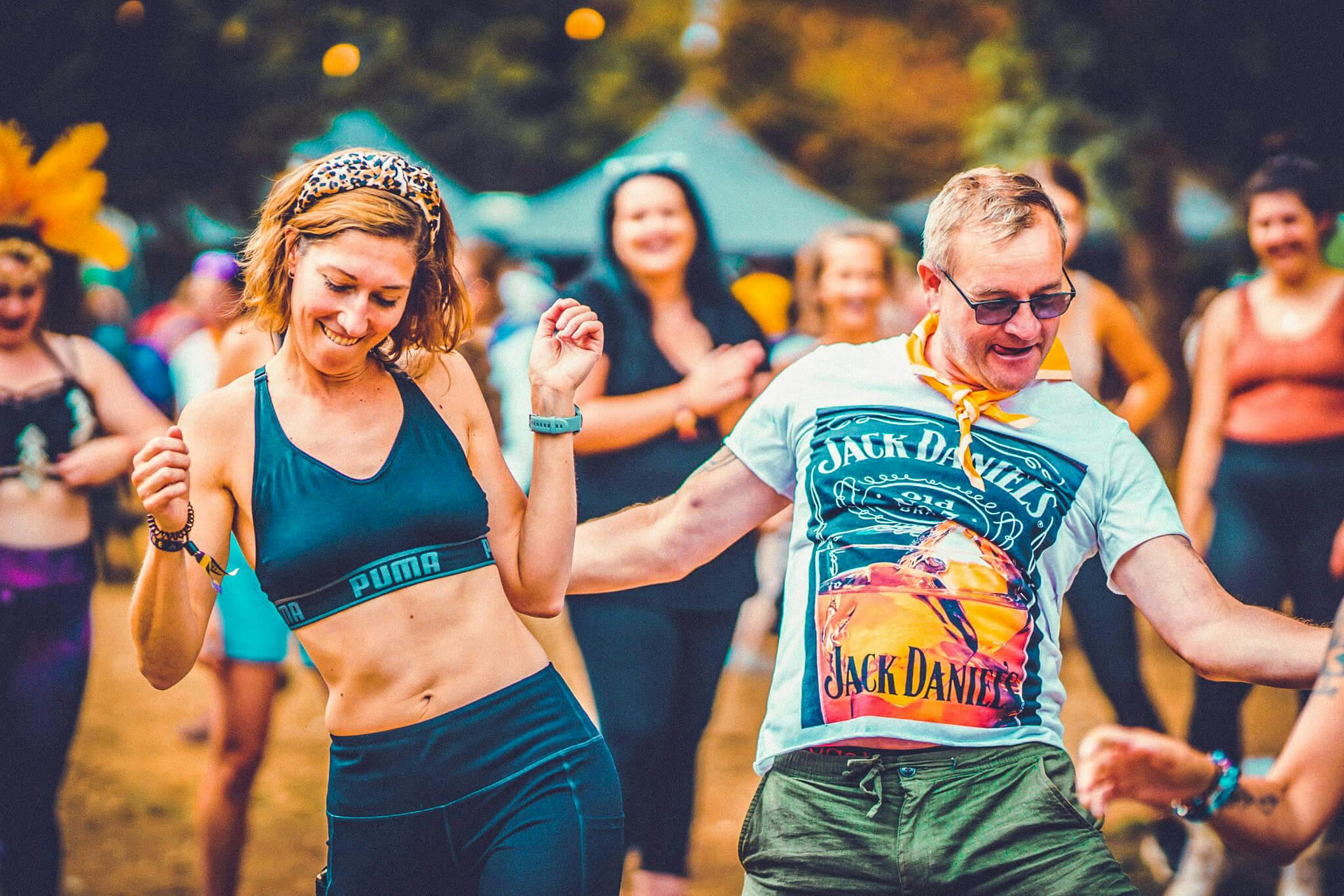People dancing at a festival