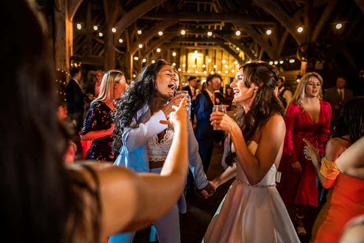 wedding couple cheers drinks