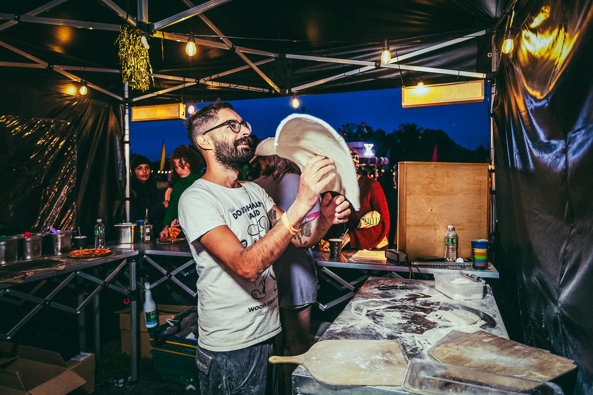 Chef tossing a pizza