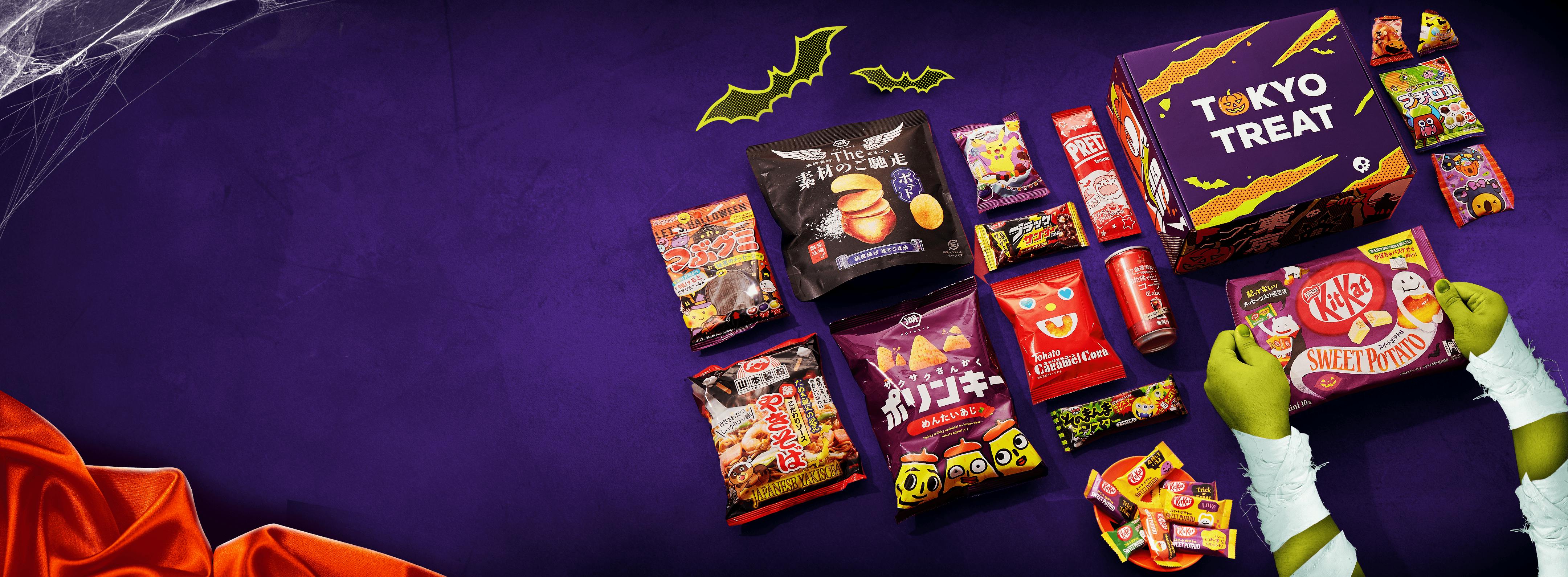 The special Halloween-edition TokyoTreat box sits against a dark purple background, surrounded by the Halloween box items.