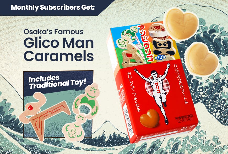 TokyoTreat's monthly bonus is pictured with Glico Running Man caramels in a red box and wooden traditional toys.