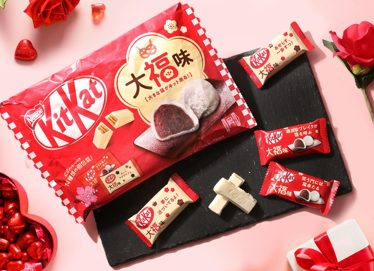KitKat Japan Lucky Daifuku on a plate with Valentine's Day roses and hearts.