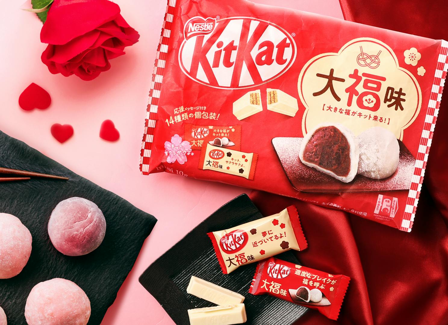 Limited edition Japanese KitKat Mochi Daifuku is displayed with roses and hearts Limited edition Japanese KitKat Mochi Daifuku is displayed with roses and hearts