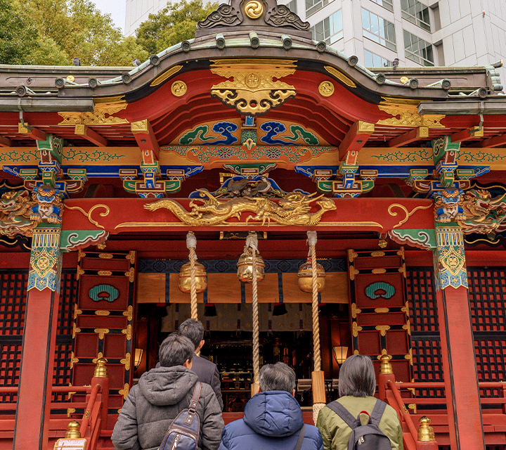 People visiting a shrine in Japan.