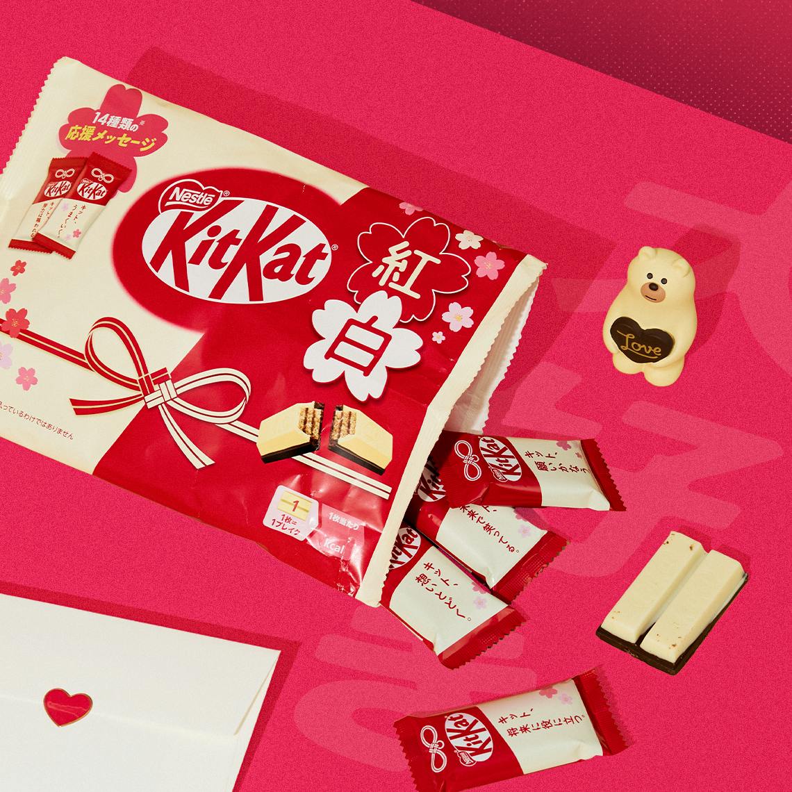 Red and White KitKats on a red background.