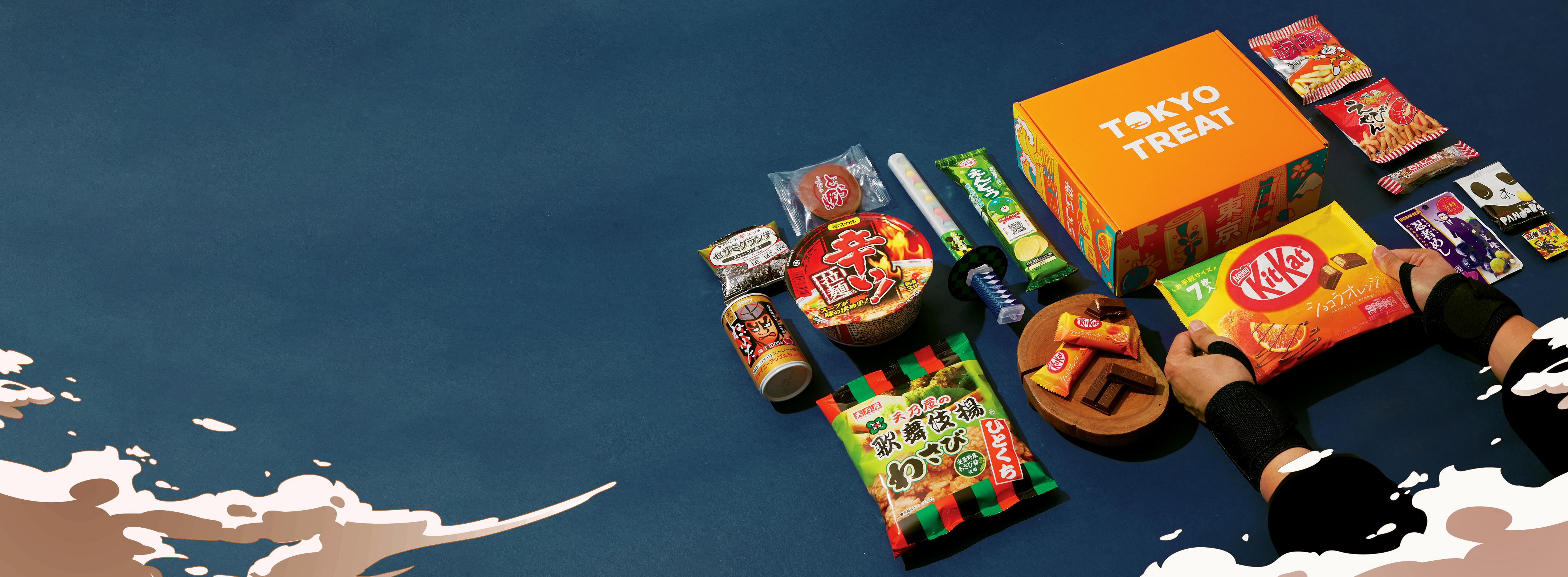 The TokyoTreat box sits on a blue background, surrounded by box items and ninja-inspired motifs.