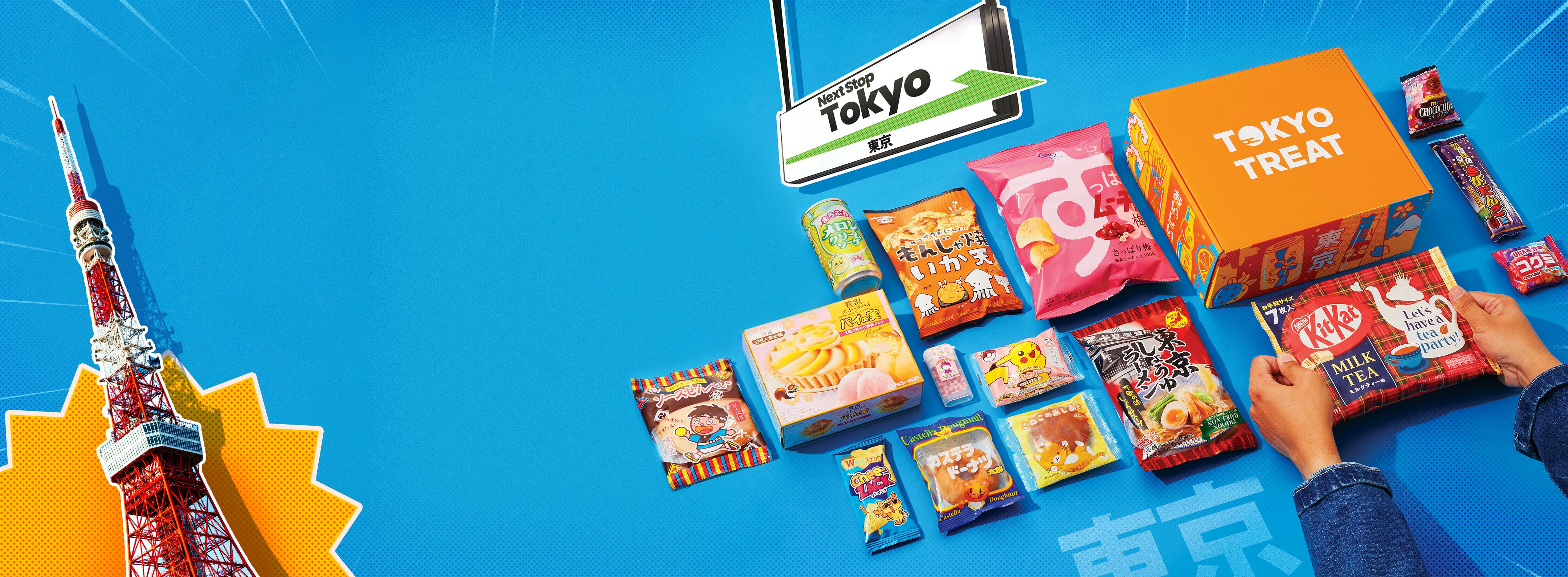 The TokyoTreat box sits on a blue background, surrounded by Tokyo landmarks and motifs.