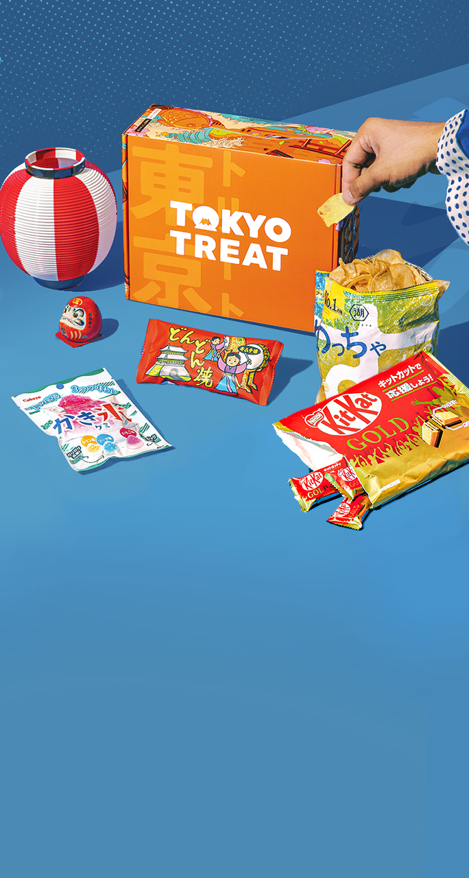 TokyoTreat box sits on a blue background, surrounded by Summer Matsuri Flavorfest box items.