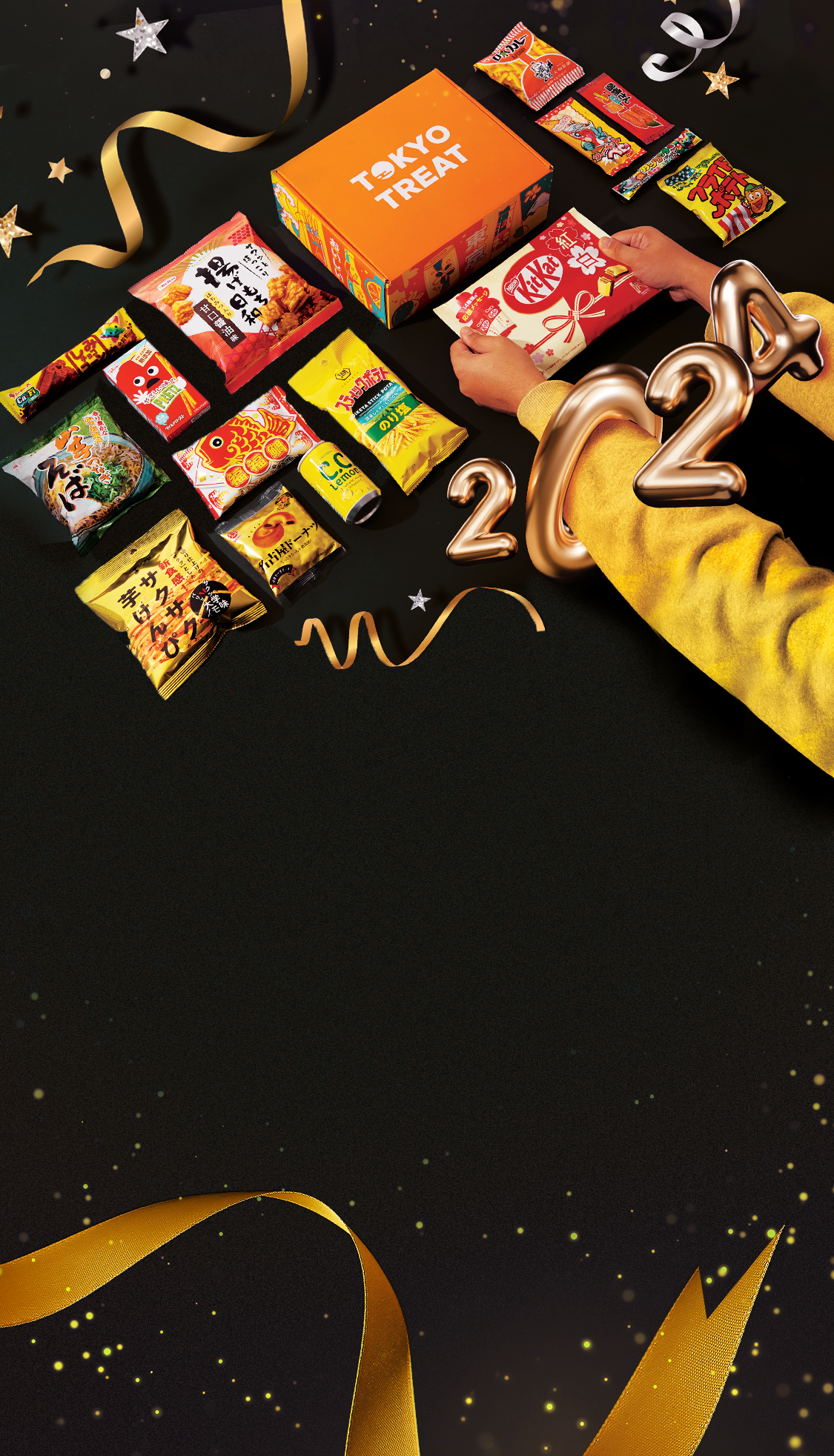 TokyoTreat box sits against a dark backdrop, surrounded by box items and New Year's motifs.