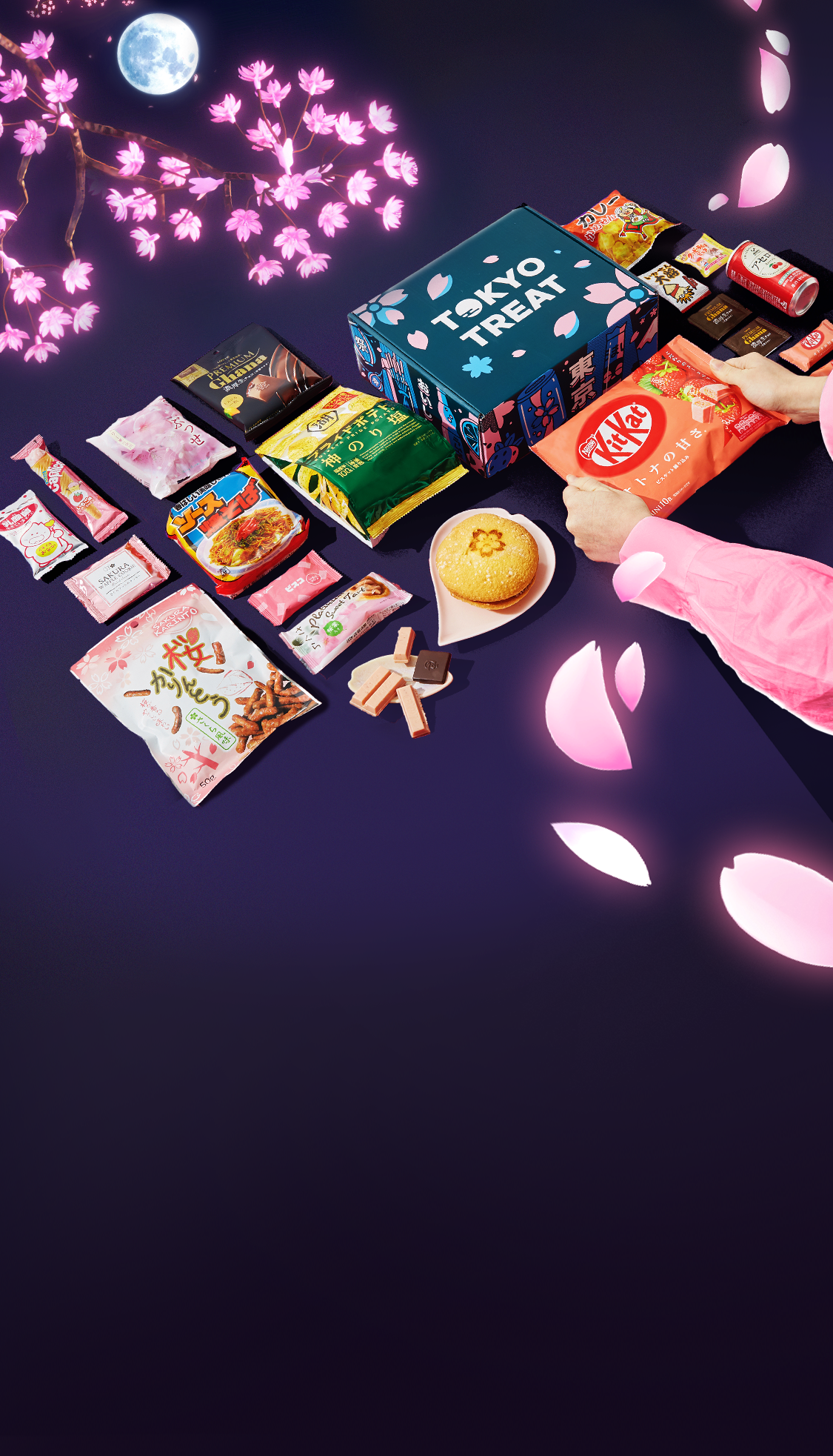TokyoTreat box sits against a dark purple background, surrounded by cherry blossoms and box items.