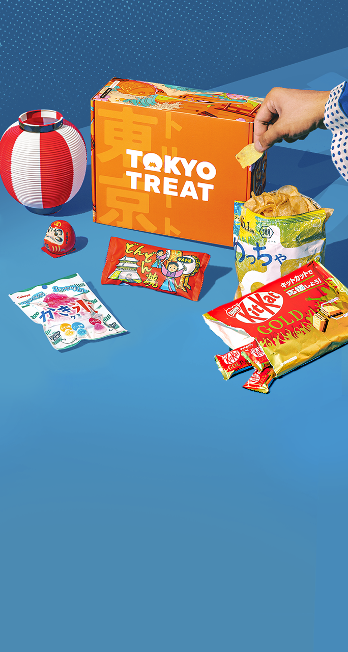 The TokyoTreat box sits on a blue backdrop, surrounded by Summer Matsuri Flavorfest snack items.
