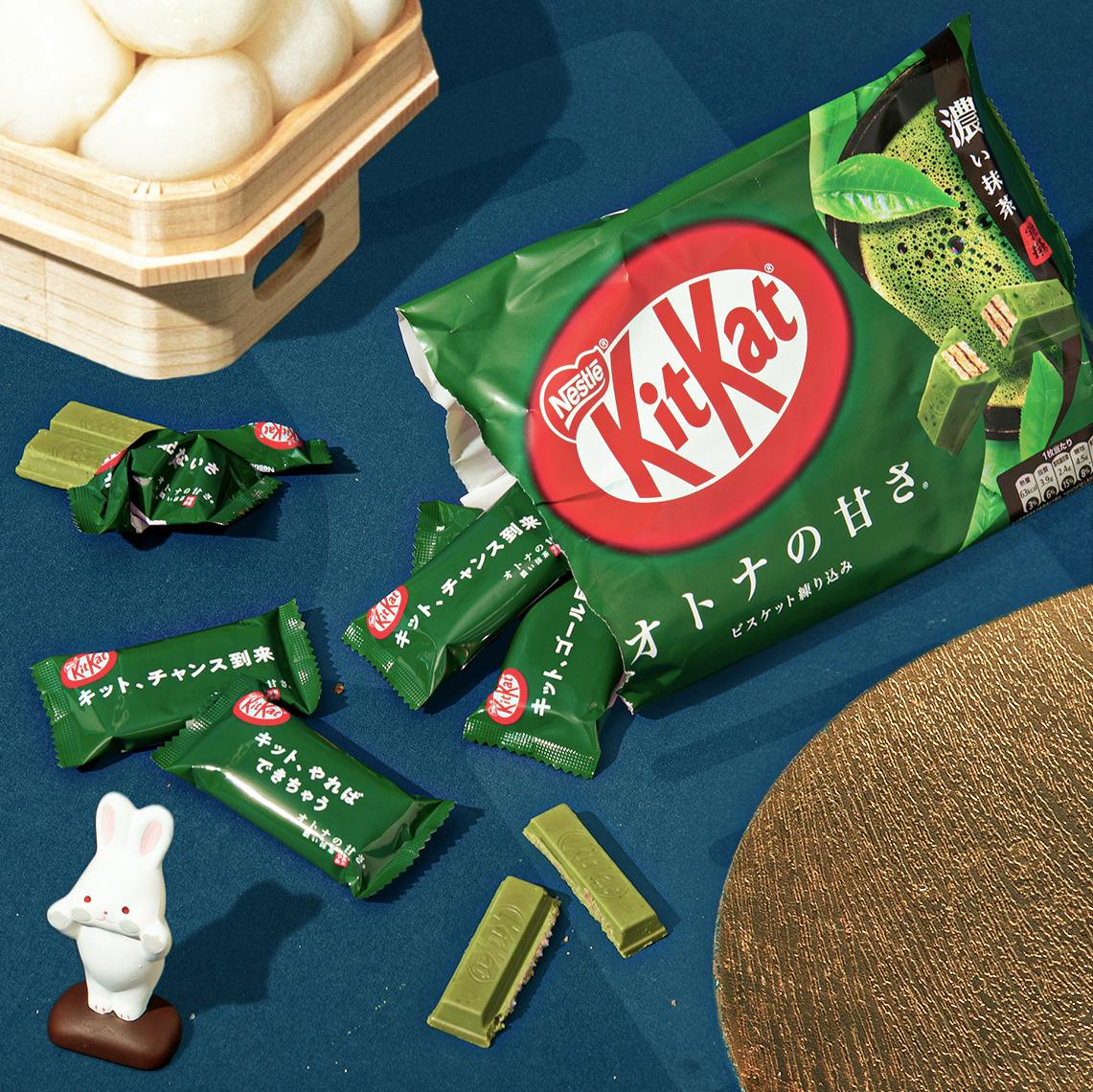 KitKat Matcha sits on a dark blue background, surrounded by Tsukimi motifs.