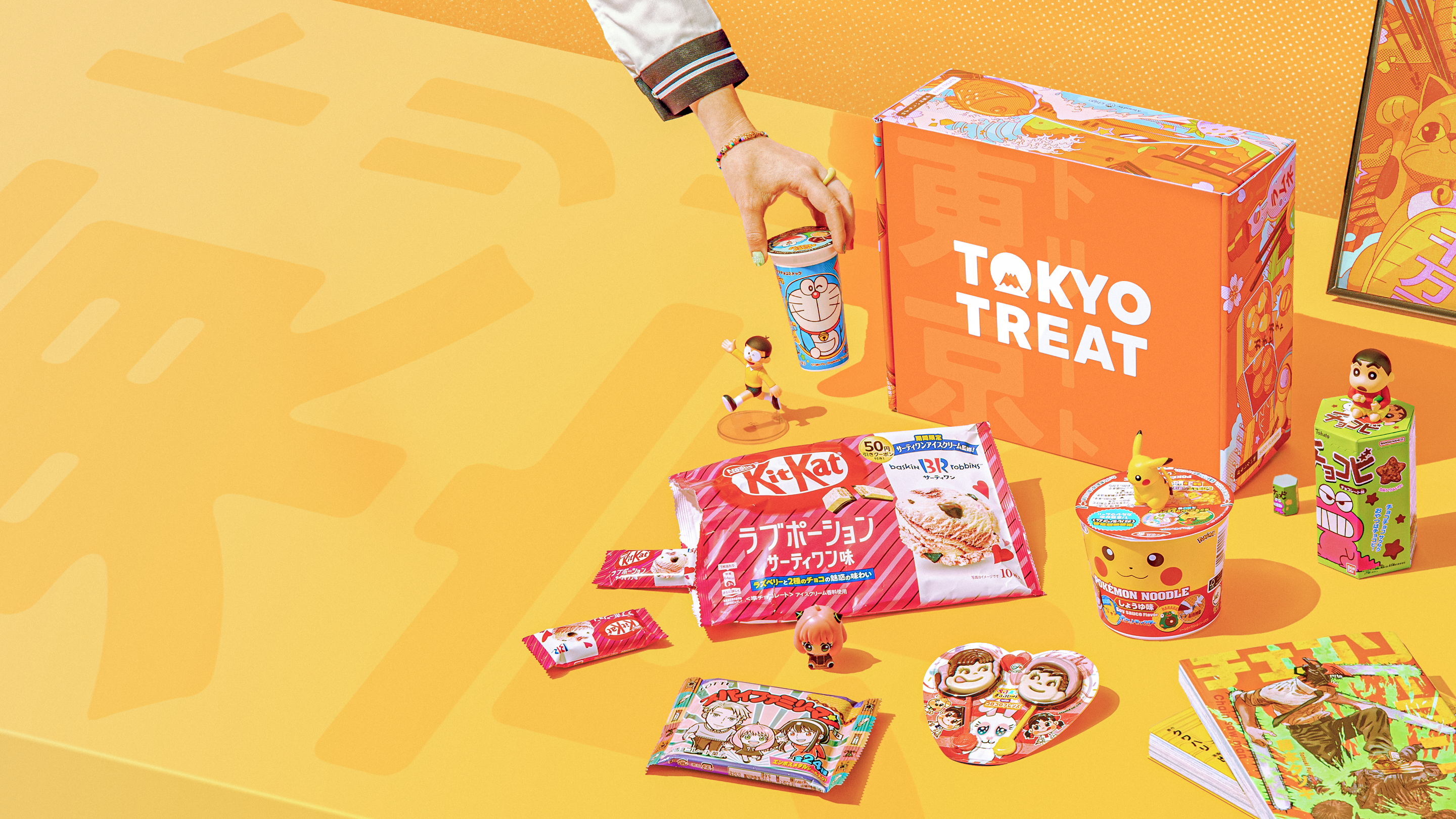 The TokyoTreat box surrounded by incredible snacks from Japan!