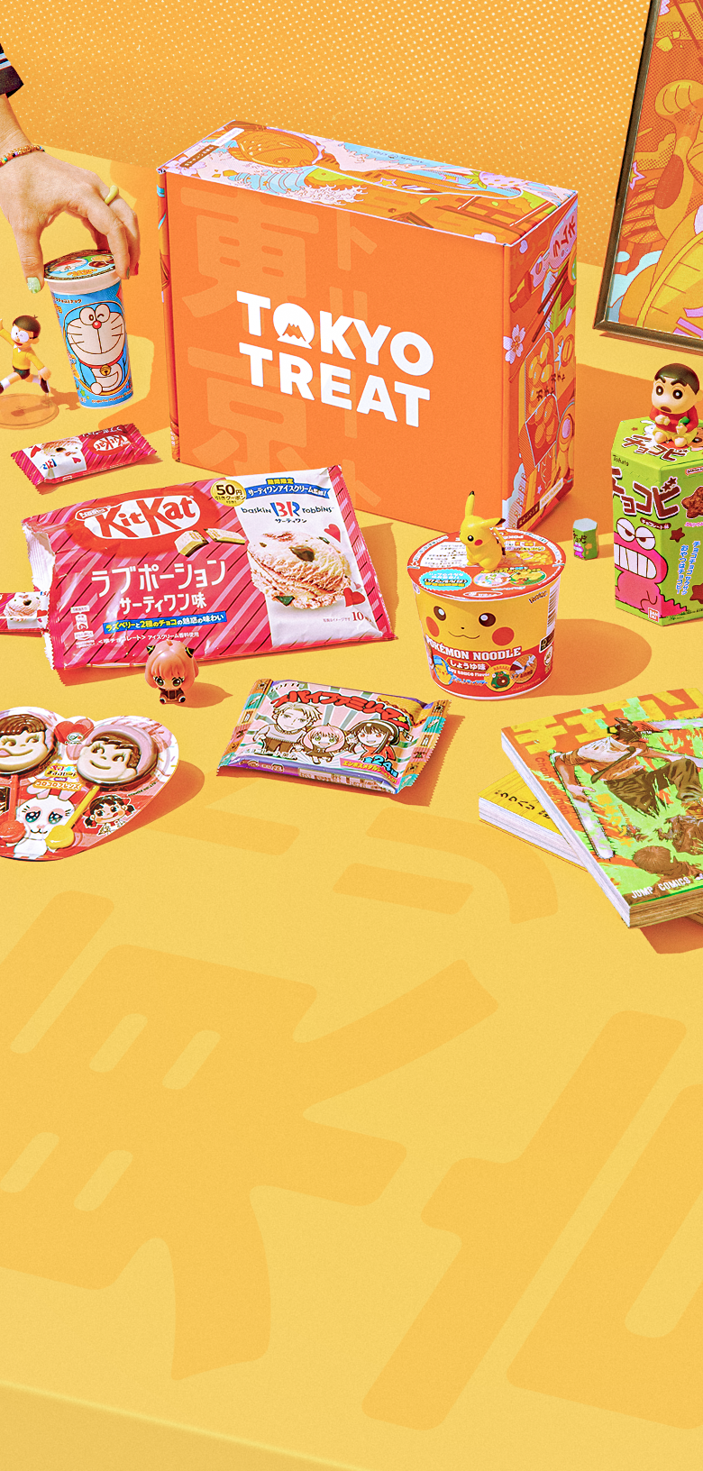 The TokyoTreat box surrounded by incredible snacks from Japan!