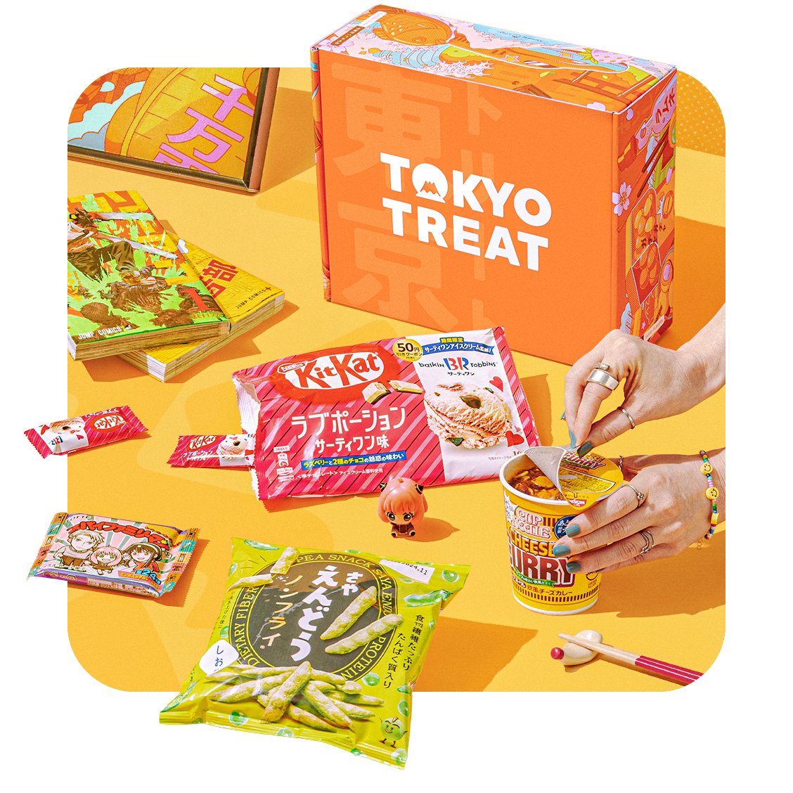 The TokyoTreat box surrounded by incredible snacks from Japan!