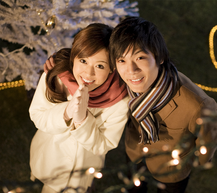 A couple in awe of the holiday season.