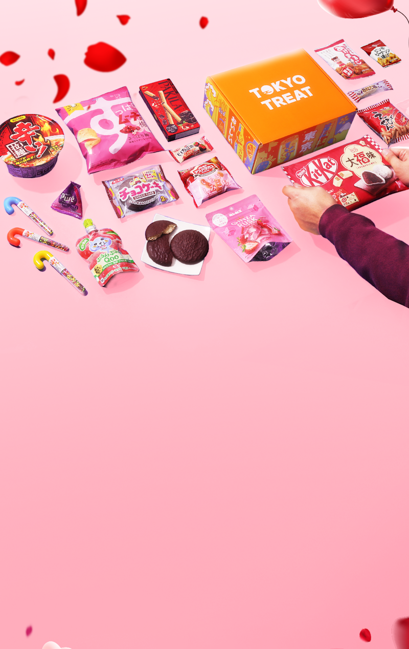 The TokyoTreat Valentine's Day box featuring KitKat Japan, Qoo, and Koikeya is displayed with hearts and roses.