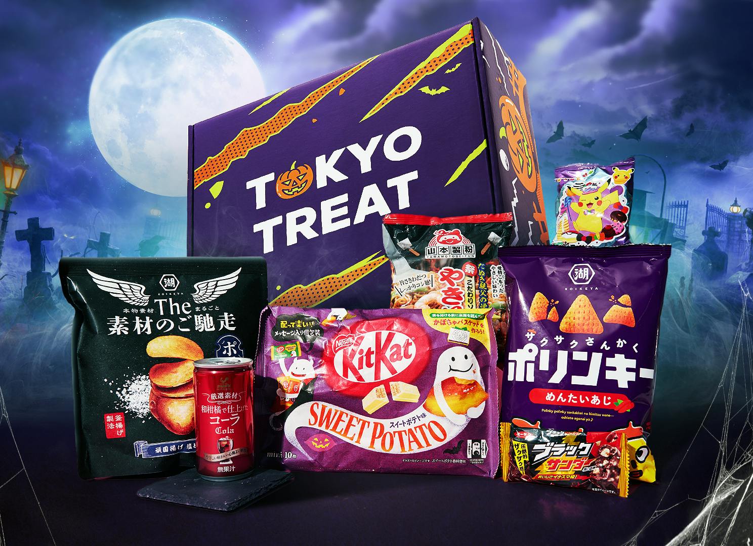 The special Halloween-edition TokyoTreat box sits with its most popular items against a backdrop of a spooky graveyard.